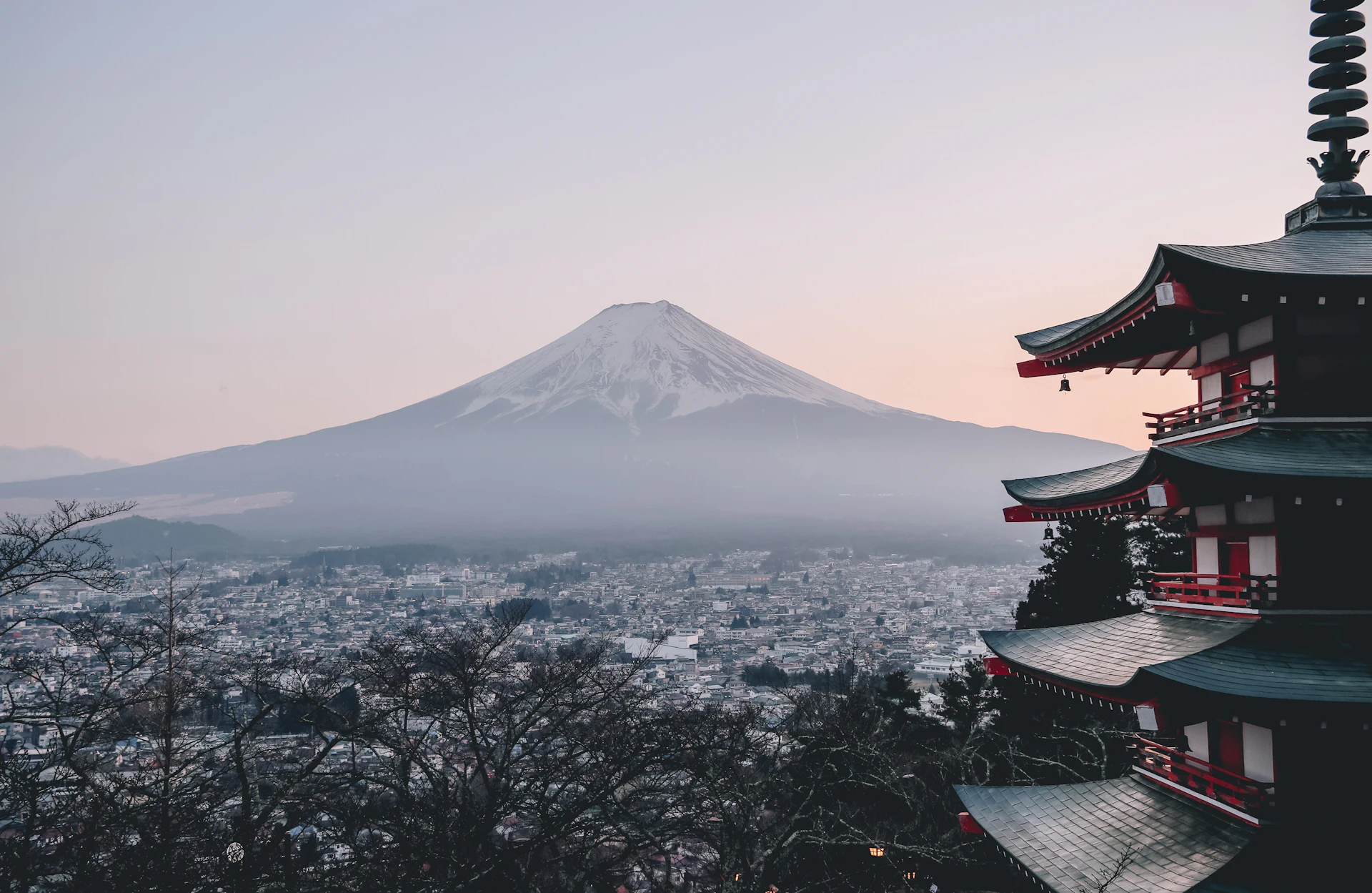 Family in the UAE organizing Japan short-stay visa documents with shared itinerary and sponsor evidence