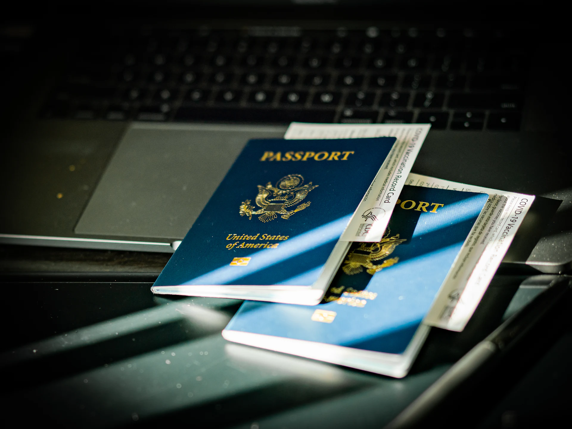 UAE resident reviewing an old U.S. B1/B2 visa and passport for renewal from Dubai